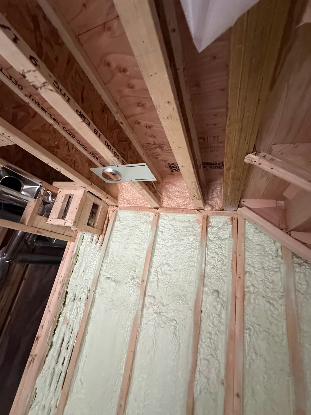 5" (R31) of 2lb closed-cell spray foam on a sloped cathedral ceiling roof deck and 3.5" (R22) on exterior walls in Scarborough, Toronto (Guildwood & Birch Cliff) [JOB-2025-10-07-01]