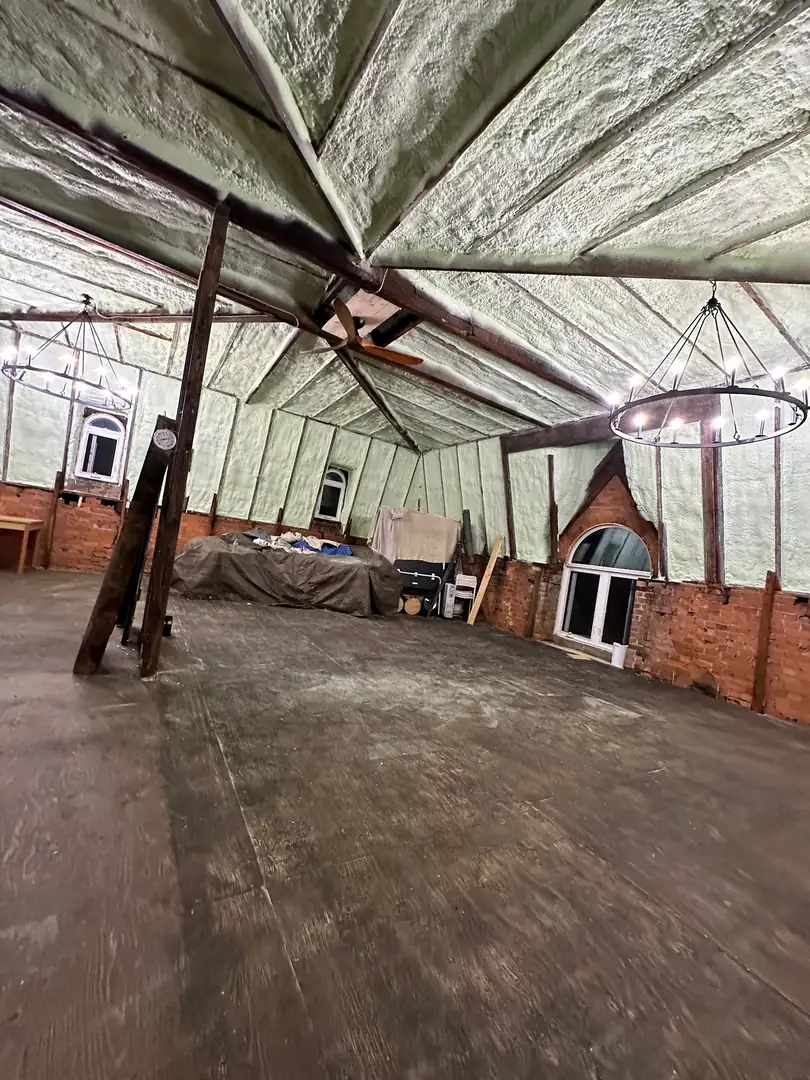 5" (R31) of 2lb closed-cell spray foam on a sloped cathedral ceiling roof deck and 3.5" (R22) on exterior walls in Oakville (Morrison & Glen Abbey) [JOB-2026-03-10-01]