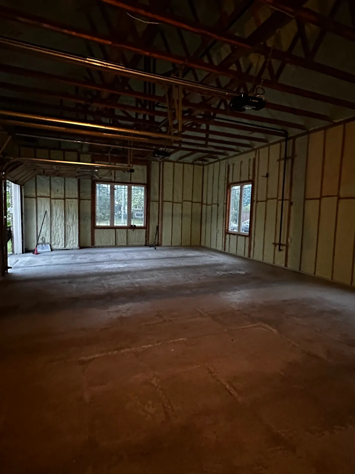 3.5" (R22) of 2lb closed-cell spray foam across exterior 2x6 wood stud cavities in Oshawa & Clarington [JOB-2025-06-19-01]