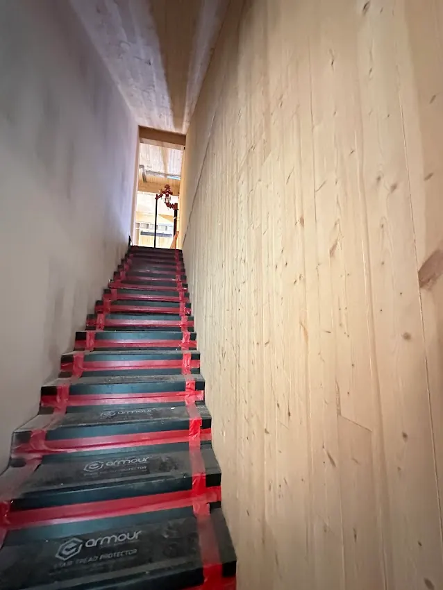 Clear Sansin Firestop 99 intumescent fire coating applied to high-quality pressurized mass timber walls and ceilings in Brampton (Castlemore & Credit Valley) [JOB-2026-07-24-01]